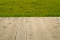Wooden Planks with green grass Royalty Free Stock Photo
