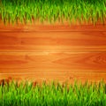 Wooden planks with green grass background Royalty Free Stock Photo