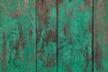 Wooden planks painted green.