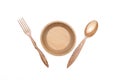 Wooden plate bowl with spoon and fork. Royalty Free Stock Photo