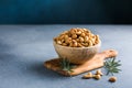 wooden plate filled with cashew nuts Royalty Free Stock Photo