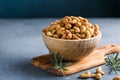 wooden plate filled with cashew nuts Royalty Free Stock Photo