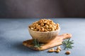 wooden plate filled with cashew nuts Royalty Free Stock Photo