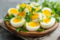 A wooden plate holds perfectly boiled eggs, cut in half and decorated with parsley, on a linen cloth.