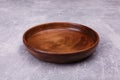 A wooden plate on the table Royalty Free Stock Photo