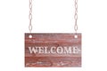 Wooden plate of worn brown boards hangs on a metal chain. White isolate With welcome sign Royalty Free Stock Photo