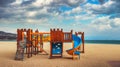 Wooden playground for small children on the beach in sunny morning. Sea sunrise Royalty Free Stock Photo