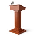 A wooden podium with a microphone for public speaking or presentations Royalty Free Stock Photo
