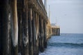 Wooden poles of Avila Beach pier, California Royalty Free Stock Photo