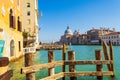 Wooden poles boats mooring at Grand Canal Canale Grande Venice Italy Royalty Free Stock Photo