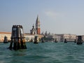 Wooden poles marking the channel, Venice, Italy