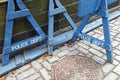 Wooden police barrier with white stenciled lettering