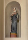 Wooden polychrome statue of Saint Rita of Cascia in the Church of Saint Stephen in Menaggio on Lake Como.