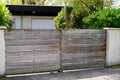 Wooden portal house in front of home wood door garden entrance