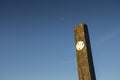 Wood post against blue sky Royalty Free Stock Photo