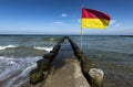 Wooden post at the beach on the baltic sea near Ahrenshoop, Germany