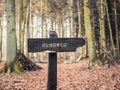 Wooden Post indicating circular path Royalty Free Stock Photo