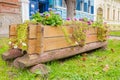 Wooden pot with flowers