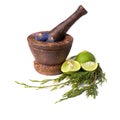 Wooden pounder with flowers and lime isolated