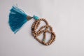 Wooden Prayer Beads with Blue Tassel Royalty Free Stock Photo