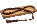 Wooden prayer beads on wooden box isolated on transparent background Royalty Free Stock Photo
