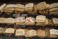 Wooden prayer tablets with Japanese characters in a shrine in Japan