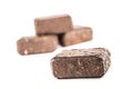 Wooden pressed briquettes from biomass on a white isolated background Royalty Free Stock Photo