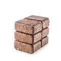 Wooden pressed briquettes from biomass on a white isolated background Royalty Free Stock Photo