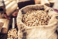 Wooden pressed pellets and briquettes from biomass. Royalty Free Stock Photo