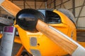 Wooden propeller on front of vintage airplane Fokker S-11 Instructor