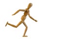 Wooden puppet is running Royalty Free Stock Photo
