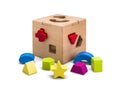Wooden puzzle box toy with colorful blocs isolated on white with clipping path Royalty Free Stock Photo