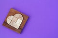 Wooden puzzle details in wooden heart-shaped box Royalty Free Stock Photo