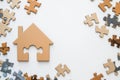 House-shaped puzzle piece with missing center Royalty Free Stock Photo