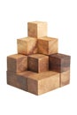 Wooden puzzle pyramid isolated Royalty Free Stock Photo