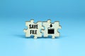 wooden puzzle with save file icon and save file text