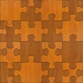 Wooden puzzles assembled for seamless background. Royalty Free Stock Photo