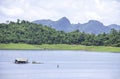 The wooden raft on the water in reservoirs and mountain views at Khao Laem National Park ,Kanchanaburi in Thailand Royalty Free Stock Photo