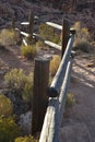 Wooden rail fence in desert landscape Royalty Free Stock Photo