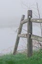 Wooden Rail Fence on a Foggy Spring Morning Royalty Free Stock Photo