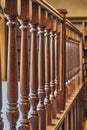 Wooden railing of classic staircase in modern house Royalty Free Stock Photo