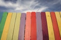 Wooden Rainbow Fence with blue sky