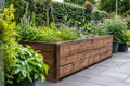 a wooden raised garden bed in a garden