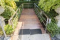 Wooden ramp way for support wheelchair disabled people in to coffee shop. Royalty Free Stock Photo