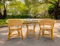 Wooden Rattan Chairs with Set of Tea on Table for Afternoon Tea Royalty Free Stock Photo