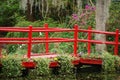 The wooden red bridge in the springtime at the Magnolia Plantation and Gardens.