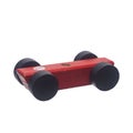 Wooden red car toy on a white background. Royalty Free Stock Photo