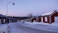 Church houses of Gammelstad in winter at sunset in Sweden