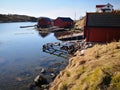 Wooden red fishing buildings by the sea