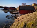 Wooden red fishing buildings by the sea